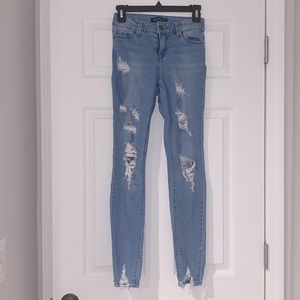 Distressed ankle jeans